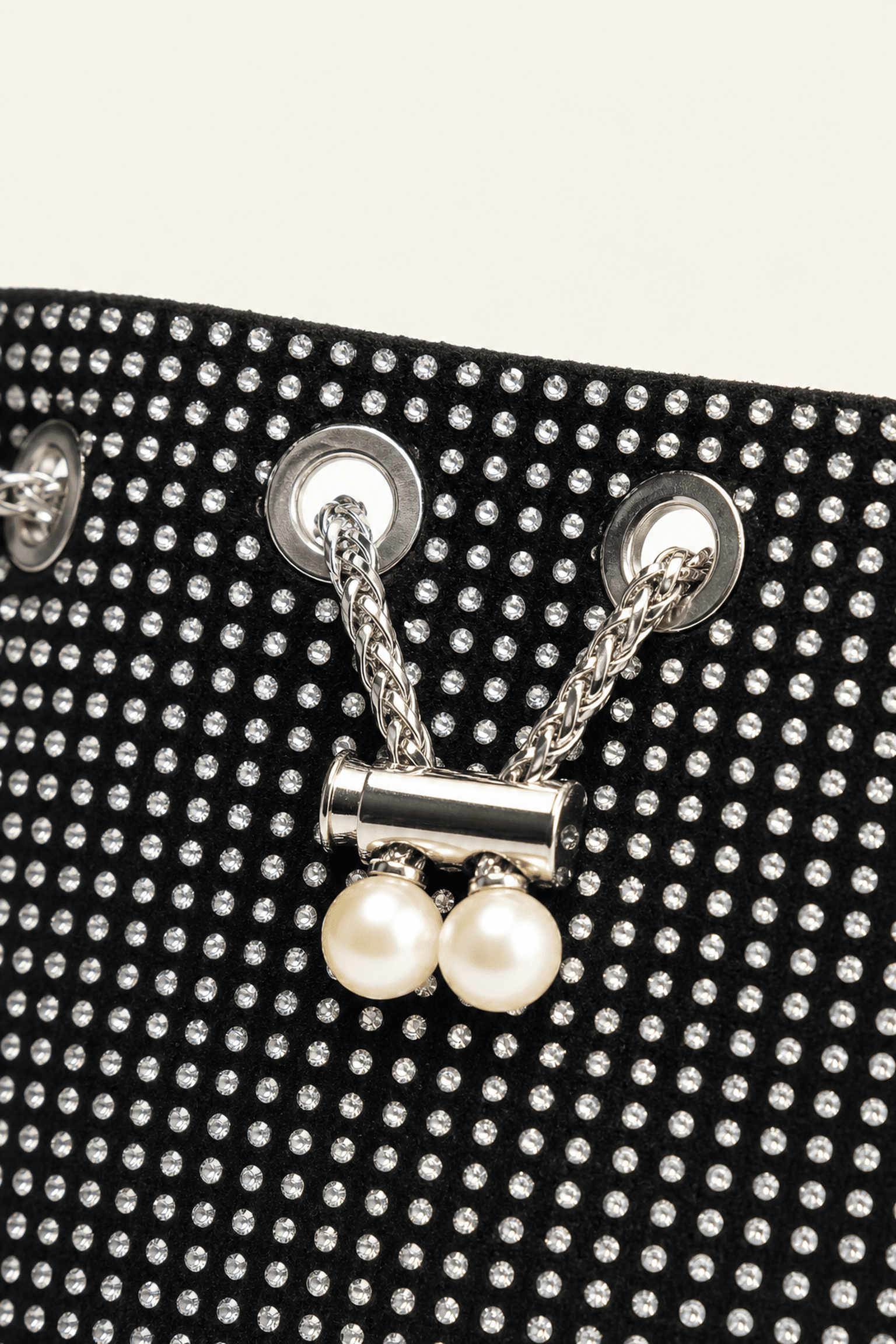 Pearl toggle and eyelet detail